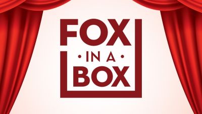 Stylized words Fox in a Box in front of a parting stage curtain
