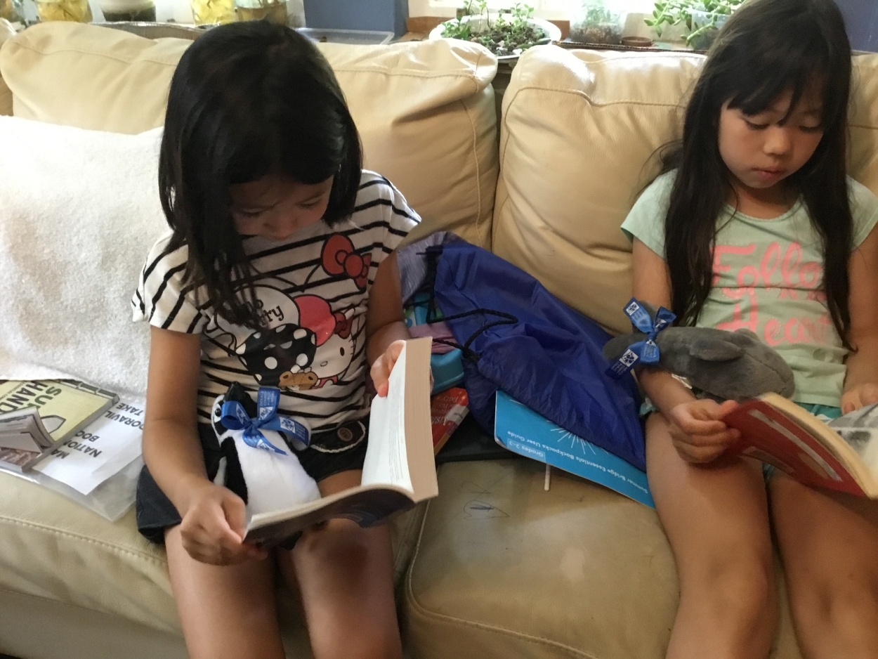 Sister reading time with their new Book Buddies!