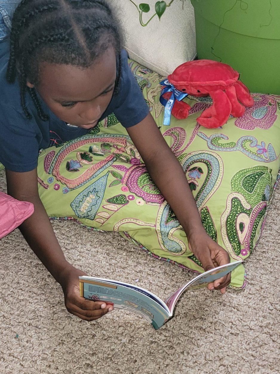 Alyjah found the perfect book to read to his Book Buddy, Baby Crabby - "Hello Crabby"!
